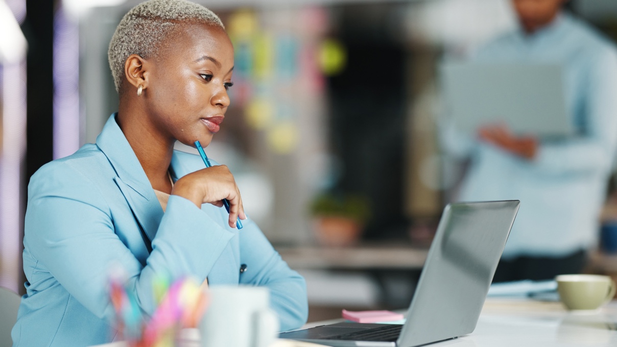 a business woman working on her laptop