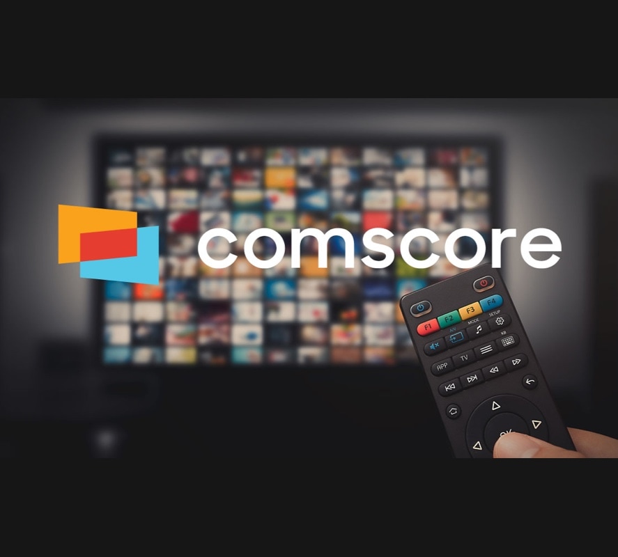 comscore logo over a blurred background