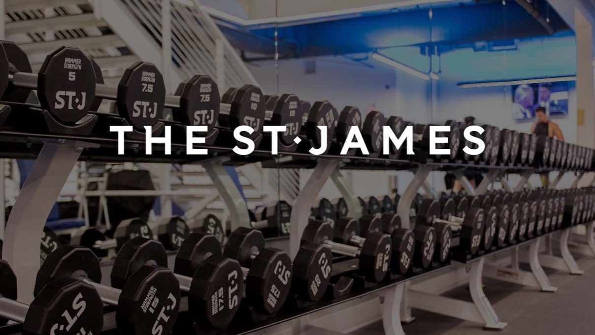 The St James logo over an image depicting a gym