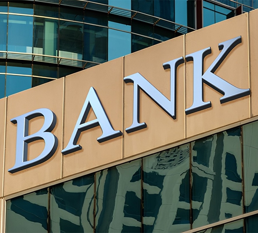 image of a bank logo on the side of a financial building